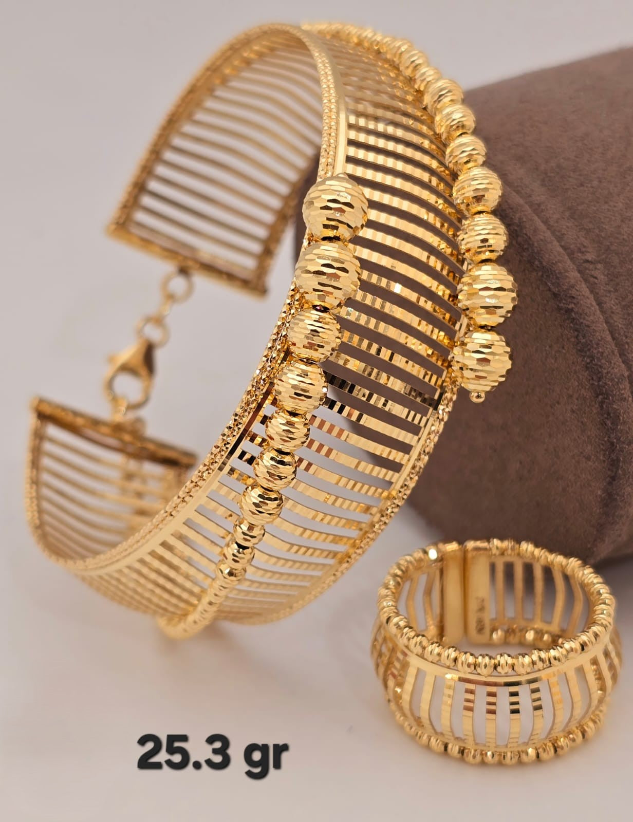 21k gold bangle with ring 25.3 grams