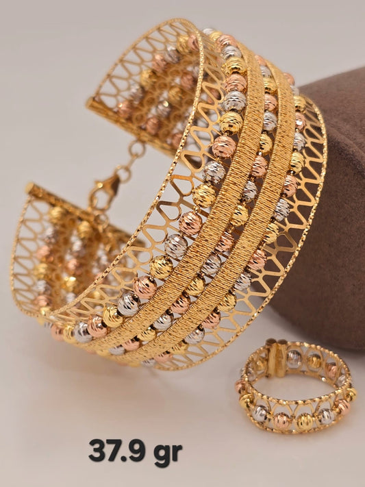 21k gold bangle with ring 37.9 grams