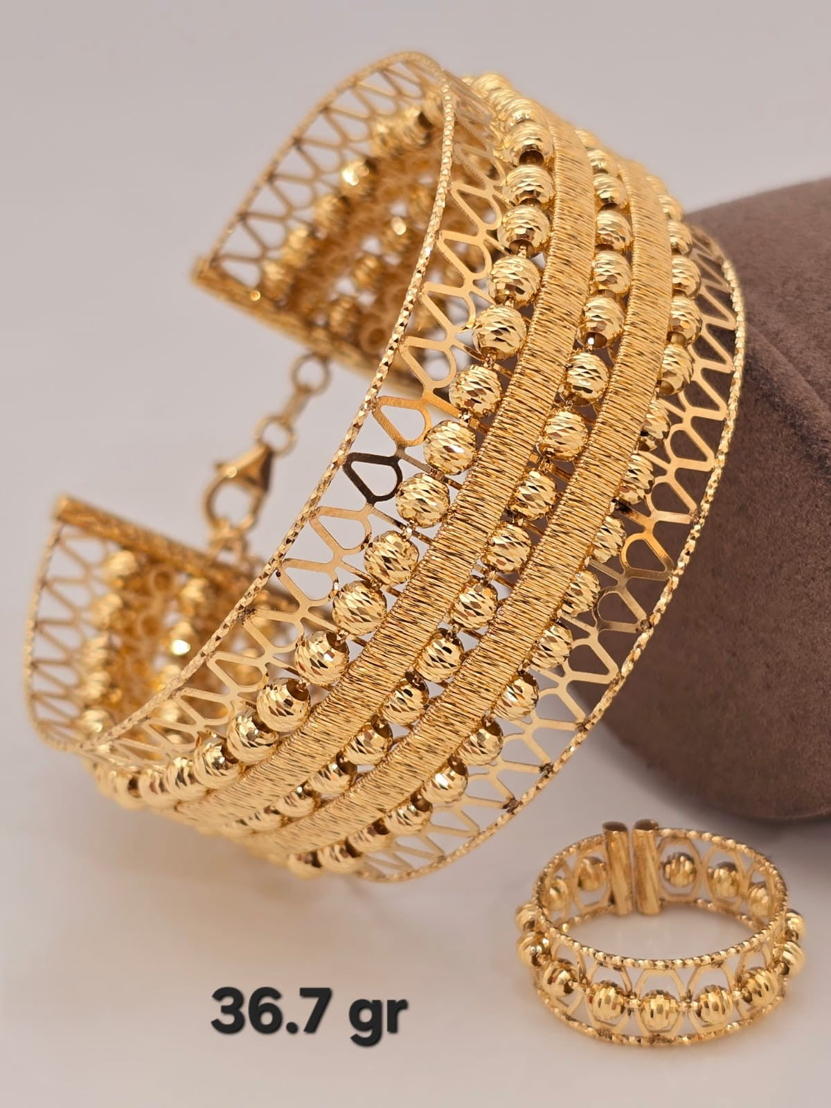 21k gold bangle with ring 36.7 grams